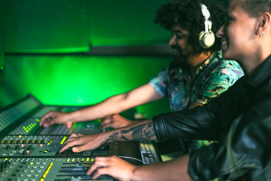 Young People Working Together with Panel Control Equipments 